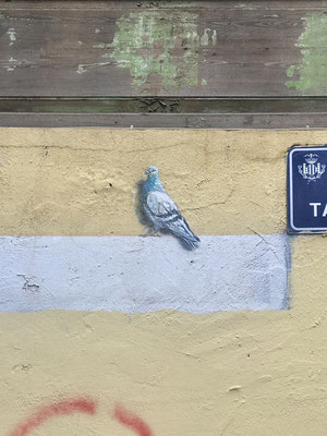 Street art with pigeon.