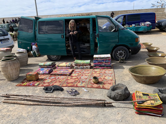 Carpet dealer at the flea market in San Jordi, Ibiza