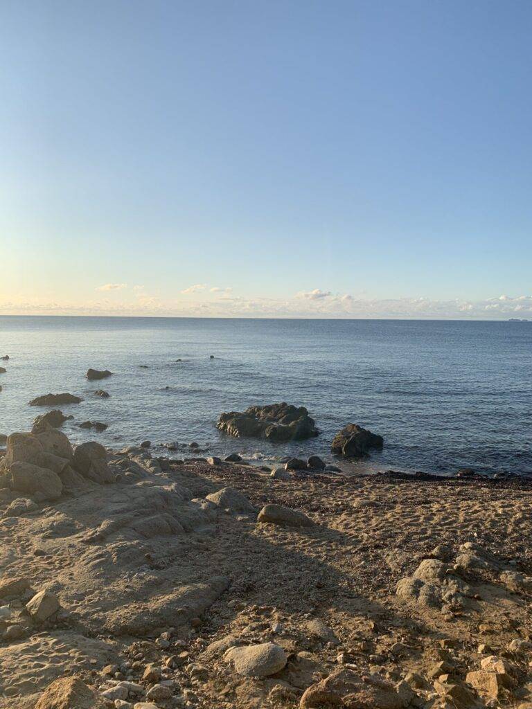 planBwagen: View of the bay and sea at sunrise at Capo Ferrato, Costa Rei, Sardinia